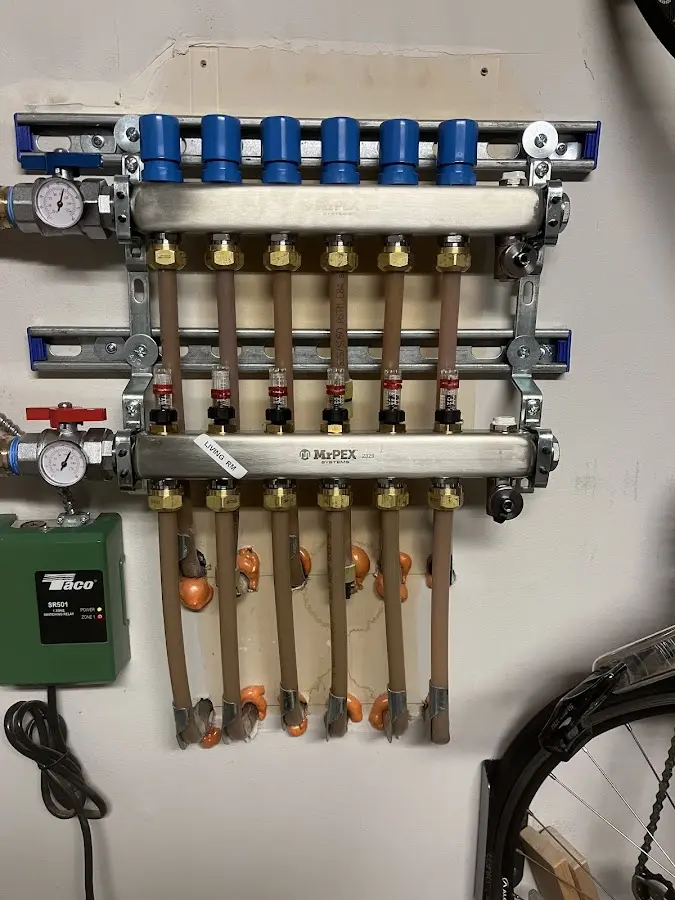 Plumber performing Water Heater Repair at a residential property in Geneseo